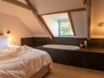 Bedroom with sunken bath Bedroom with sunken bath